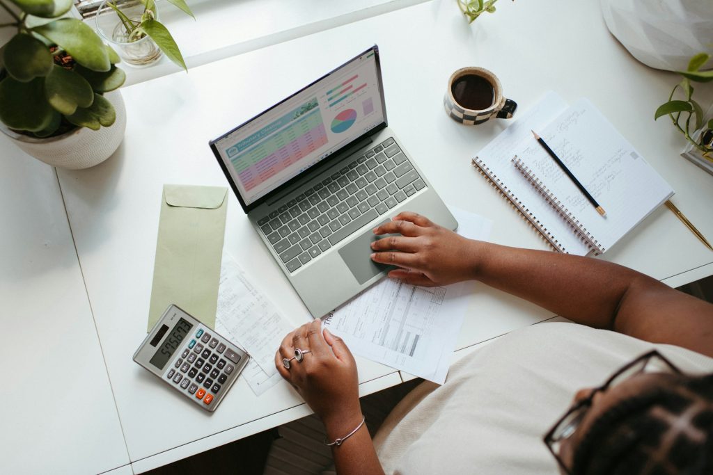 Sole trader keeping digital records on a laptop for Making Tax Digital