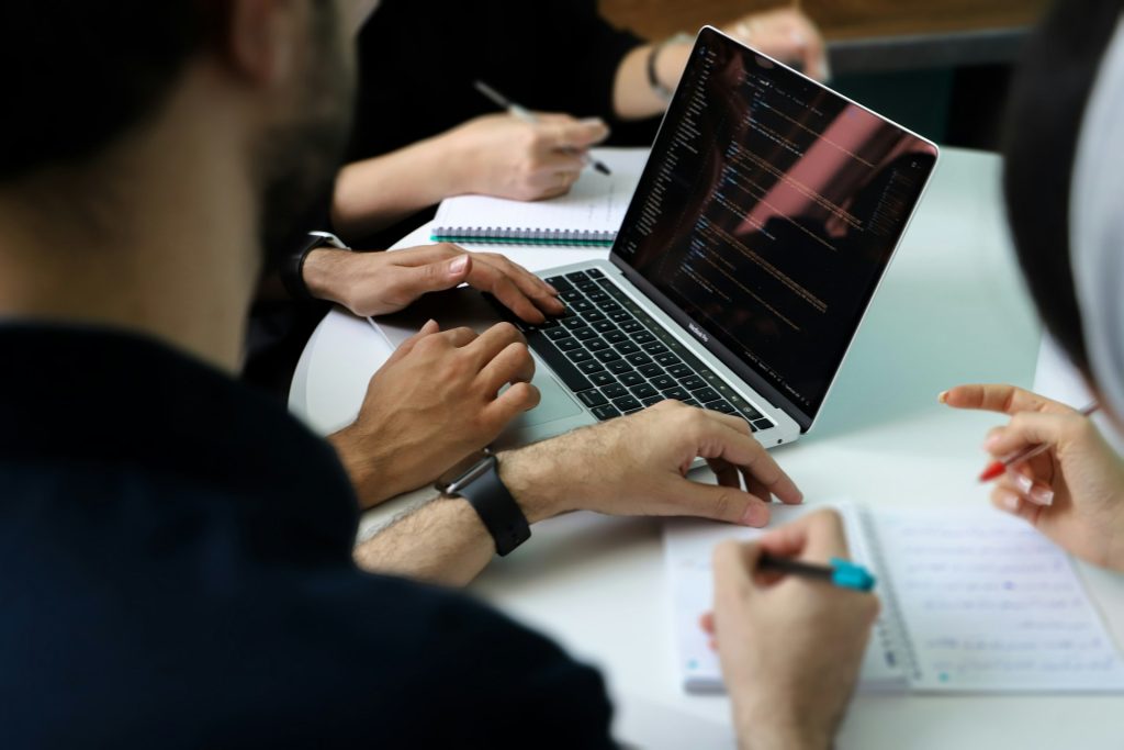 Business owner reviewing management accounts with an outsourced finance team